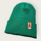 Beanie with Evergreen tree leather cuff detail